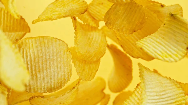 Batatas Fritas Voando Vôo Junk Food Isolado Fundo Amarelo — Fotografia de Stock