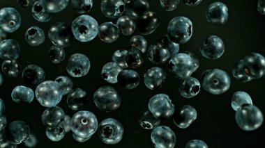 Yaban mersininin en iyi görüntüsü havada uçuşuyor. Soyut böğürtlen geçmişi.