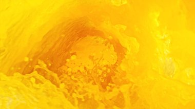 Portakal suyu sıçratmak hortum şekli yaratır. Soyut taze sulu içecekler arka planı.