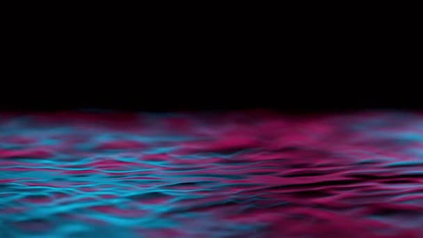 Сверхмедленное движение струи воды освещается неоновыми огнями. Съемки на высокой скорости кинокамеры, 1000 кадров в секунду.