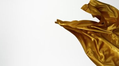 Altın Saten Kumaşın Süper Yavaş Hareketi. High Speed Cinema Camera 'da çekildi, 1000 fps. Beyaz Arkaplanda İzole Edilmiş.