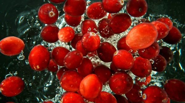 Bunch Fresh Cranberries Dropped Water Air Bubbles Splashes Isolated Black — Stock Photo, Image