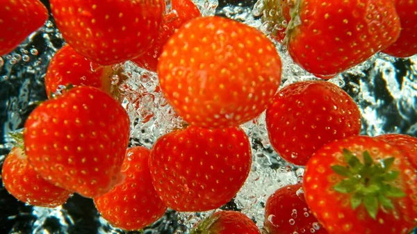 Bunch Fresh Strawberries Dropped Water Air Bubbles Splashes Isolated Black — Stock Photo, Image