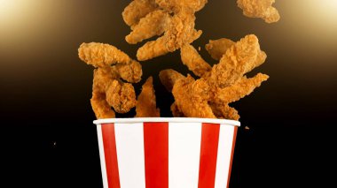 Uçan Tavuk Parçaları Kara Arkaplanda İzole Edildi, Seçici Odak. Uçan Gıda kavramı.