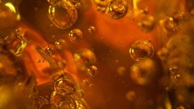 Soyut Altın Sıvı Arkaplan, Makro çekim. Viski ya da konyak yakın plan, İçecek Arkaplan.