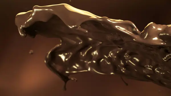 Spritzende Geschmolzene Schokolade Fliegt Der Luft Abstrakte Form Der Schokolade lizenzfreie Stockfotos