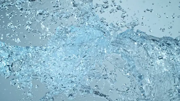 Vann Spruter Luften Blå Bakgrunn Frys Bevegelse Realistiske Vannsprut royaltyfrie gratis stockfoto