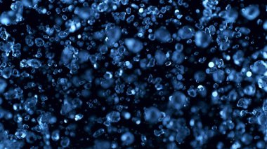Kara Arkaplan 'da soyut su sıçramaları. Su Damlalarının Dondurma Hareketi.