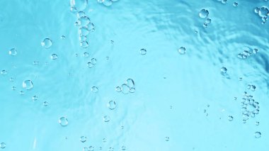 Temiz Mavi Yüzeyde Su Kabarcıklarının Üst Manzarası. Taze Soyut Su Dokusunun Stüdyo Çekimi.