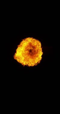 Süper Yavaş Ateş Patlaması Kara Arkaplanda izole edildi. High Speed Cinema Camera 'da çekildi, 1000 fps. Dikey Görünüm Oranı.