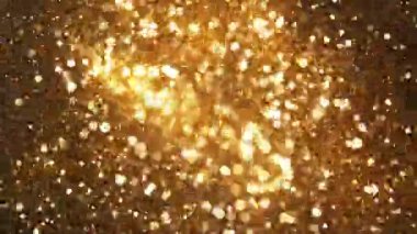 Siyah Arkaplan 'da izole edilmiş Süper Yavaş Parlayan Altın Parçacıklar Hareketi. Odaklanmanın Sığ Derinliği. Yüksek Hız Sinema Kamerası, 1000 fp..