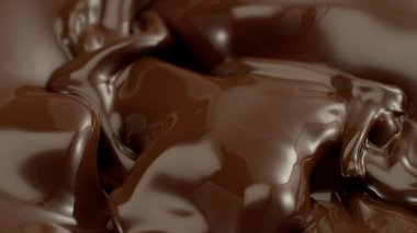 Sıcak Erimiş Çikolata Dalgalı Şekilde Sıçrıyor 'un yakın çekimi. Soyut Çikolata Arkaplanı.