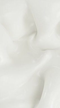 Süt ve Su Sıçratmanın Süper Yavaş Hareketi. High Speed Cinema Camera 'da çekildi, 1000 fps. Krema ve Süt Kapanışı. Dikey Görünüm Oranı.