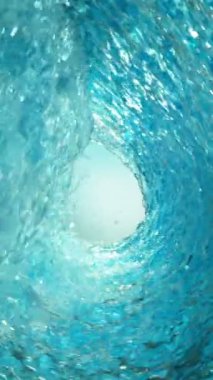 Detaylı Su Dalgalarının Süper Yavaş Hareketi. High Speed Cinema Camera 'da çekildi, 1000 fps. Su Tüneli 'nin dokusu, yukarıdan çekilmiş. Dikey Görünüm Oranı.