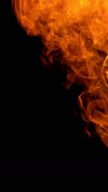 Süper Yavaş Ateş Patlaması Kara Arkaplanda izole edildi. High Speed Cinema Camera 'da çekildi, 1000 fps. Dikey Görünüm Oranı.