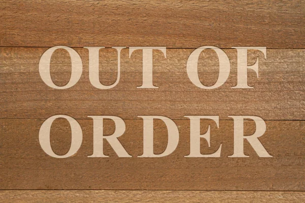 Out Order Sign Weathered Dark Brown Wood — Stock Photo, Image