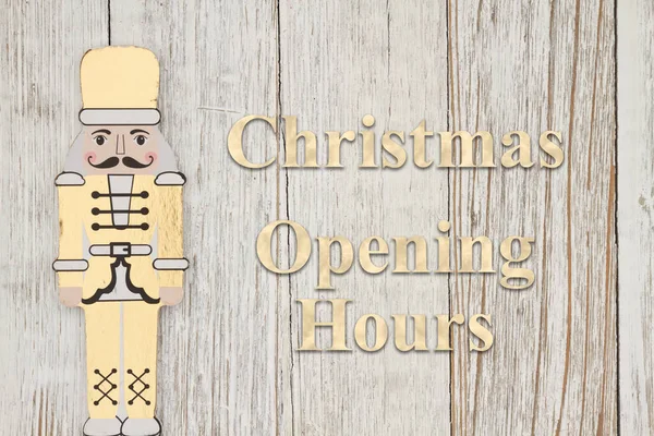 Christmas Opening Hours Message Gold Nutcrackers Weathered Wood — Stock Photo, Image