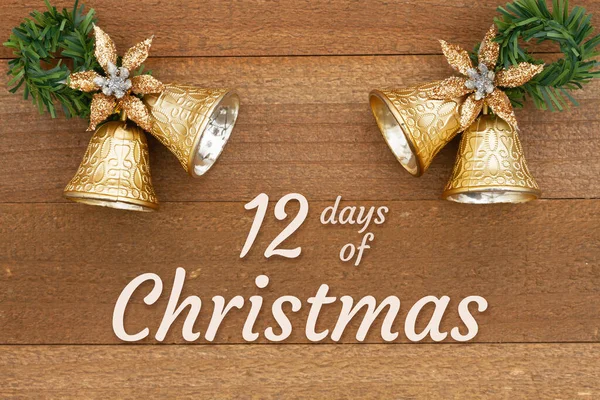 12 days of Christmas greeting with Christmas bells on weathered wood