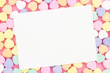 Blank greeting card with lots of candy hearts for saying thanks to your customers