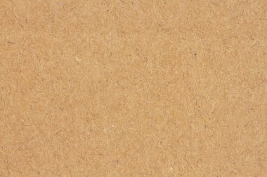 Brown recycled cardboard background for a recycling message or texture