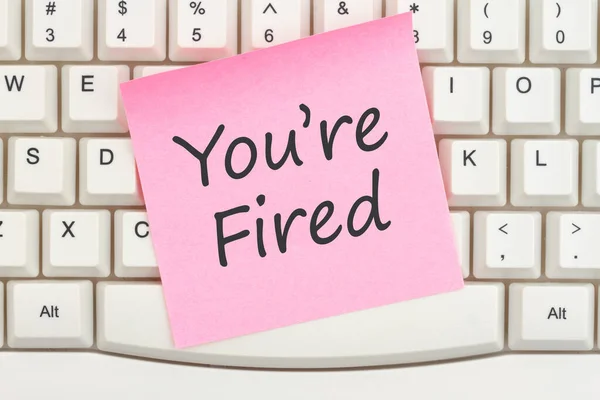 You Fired Message Pink Sticky Note Gray Computer Keyboard Pink — Stock Photo, Image