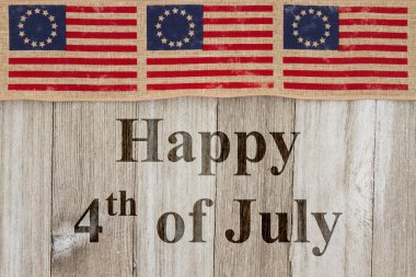 Happy Independence Day greeting, USA patriotic old Betsy Ross flag and weathered wood background with text Happy 4th of July clipart