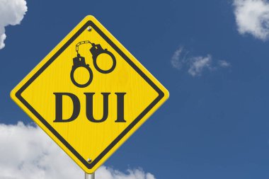  Yellow warning DUI with handcuffs road sign with sky clipart