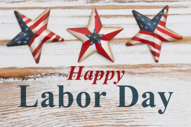 Geçmiş Amerikan İşçi Bayramı 'nız kutlu olsun. Kırmızı, beyaz ve mavi yıldızlar ve yıpranmış ahşap çizgiler Amerikan işçilerini ve ulusal gururu kutlamak için.