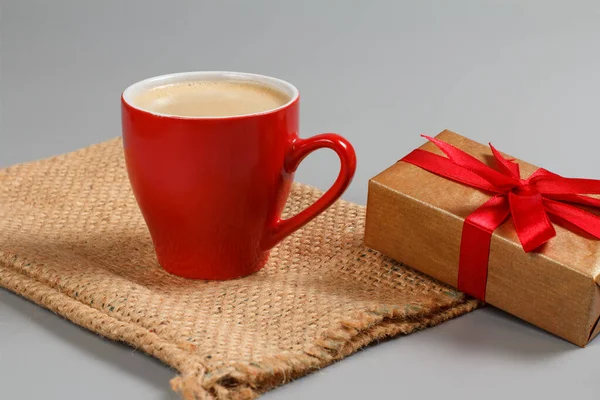 Red Cup Black Coffee Gift Box Tied Red Ribbon Sackcloth — Stock Photo, Image