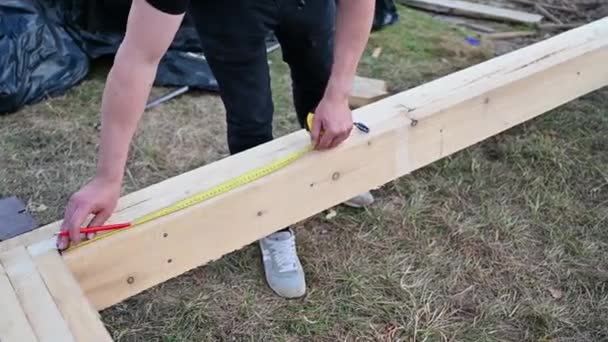 Man Worker Building Wooden Frame House Pile Foundation Close Carpenter — Stock videók