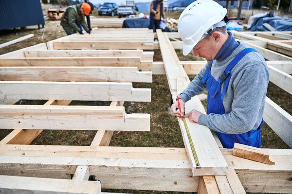 Man Worker Building Wooden Frame House Pile Foundation Carpenter Using — Foto Stock