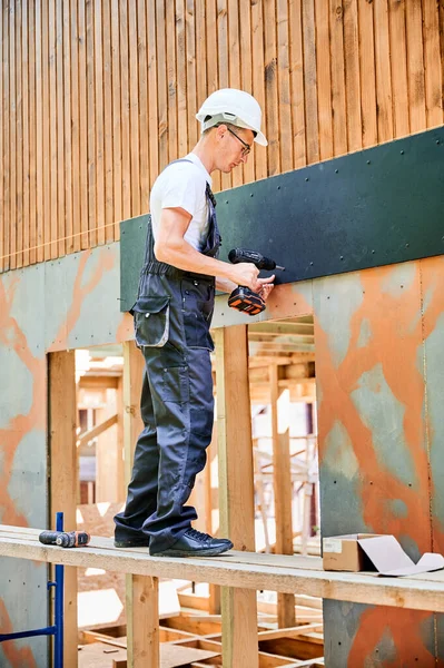 Carpenter Constructing Wooden Framed House Man Worker Glasses Cladding Facade — Stock Photo, Image