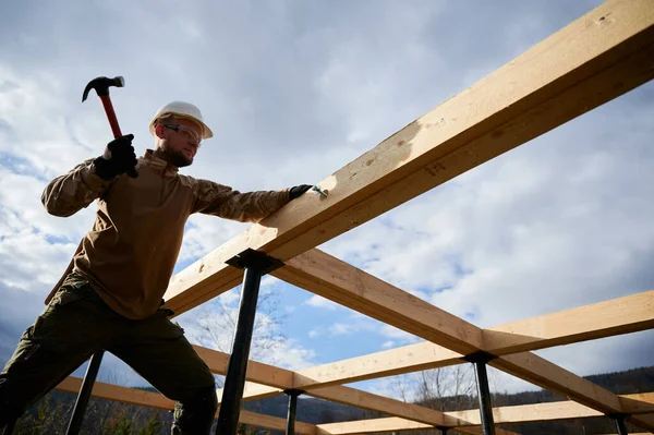 Man Worker Building Wooden Frame House Pile Foundation Carpenter Hammering — Stock Photo, Image