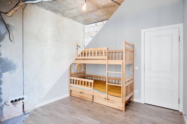 Comparison of children room with wooden bunk bed before and after restoration. Old apartment room with brick wall and new renovated flat with parquet floor and kid house bed.