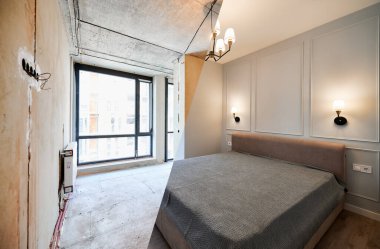 Comparison of bedroom with large panoramic window before and after renovation. Photo collage of old apartment before restoration and new renovated flat with bed and elegant interior design.