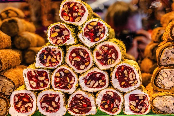 Colorful Turkish Delight Lokum Dessert Pastry Shop Grand Bazaar Istanbul Turkey. Turkish delight is a dessert gel made from sugar and starch. First made in 1700s and from different types of nuts. Grand Bazaar is the major covered market in Turkey.