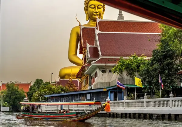 stock image Bangkok, Thailand - February 6, 2023 Yai Canal Boat Buddha Wat Paknam Distance Bangkok Thailand. Canal boats are long thin and colorful in Thailand.