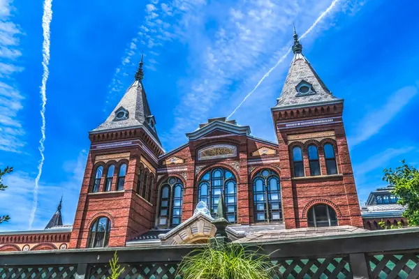 stock image Arts and Industries Building Garden Smithsonian Museum Institution Washington DC. Second oldest of the Smithsonian museums on the National Mall built in 1881.