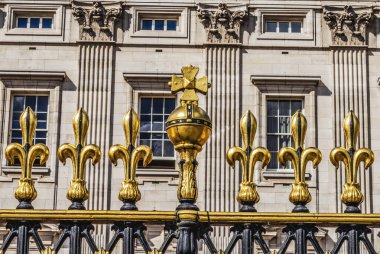 Cross Orb Gate Buckingham Palace Westminster London England.  Orb Symbolizes Christ Dominion Over the World. Christian symbol authority since Middle Ages. Used Coronation English Sovereign.   clipart