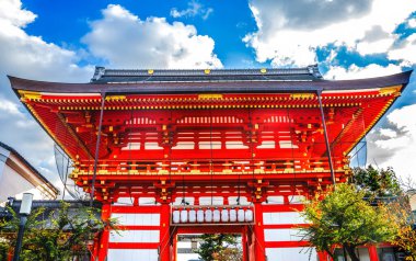 Colorful Red Main Gate Yasaka Gion Shinto Shrine Kyoto Japan. Shine established 656 AD.  clipart