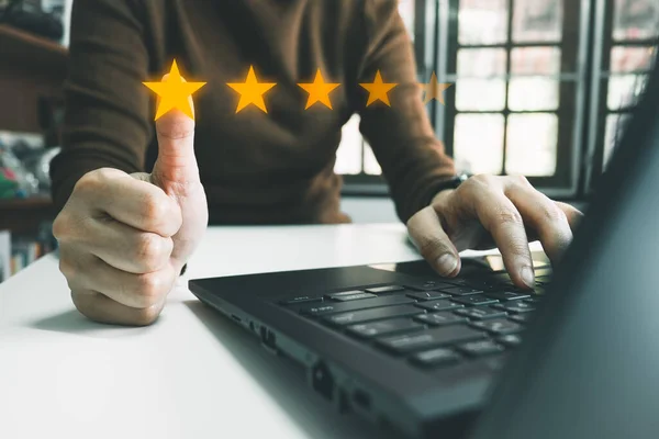 Officer showing the symbol of top service 5 star quality assurance, excellent warranty, world standard, ISO certification, development and improve the quality of the organization concept.