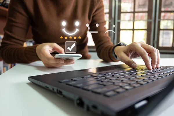 Businesswoman assess service satisfaction 5 stars by smartphone, Corporate care high standard, ISO, customer care, Excellent level, quality guaranteed in service of company. the highest service.