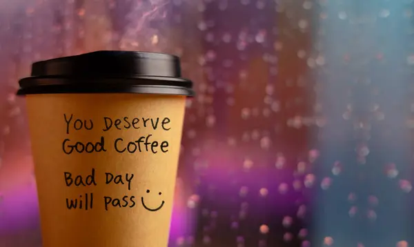 Mental Health, Comfortable and Encouragment Concept. Message on Coffee Cup to Healing Negative Mood on Bad Rainy Day