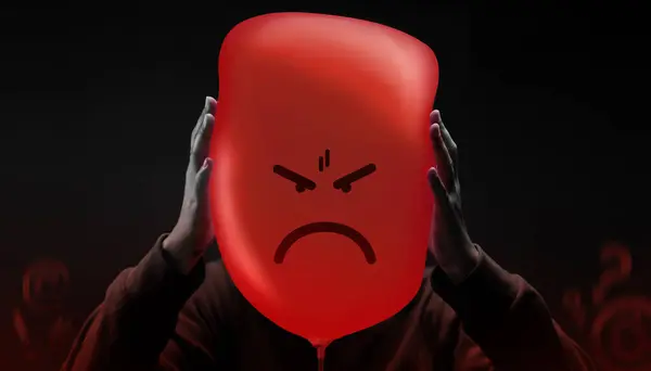 精神健康概念 一个带着红色气球的暴躁 沮丧的人 图库图片