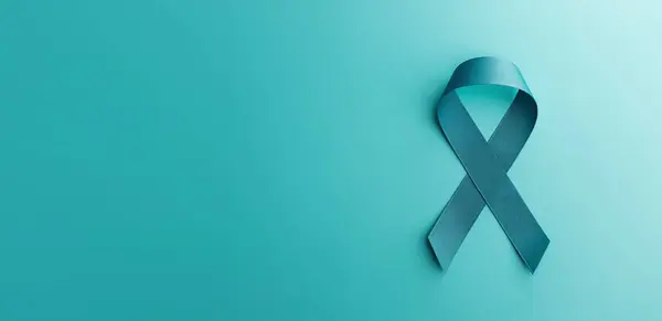 Ovarian Cervical Cancer Awareness Teal Ribbonin Top View Position Utérus Image En Vente