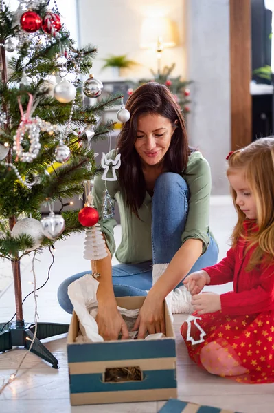 Beautiful Mother Daughter Decorating Christmas Tree — Stock Photo, Image