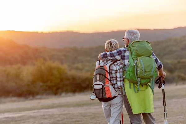 stock image happy senior couple hiking in mountains