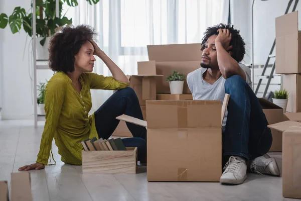 stock image african american couple moving in new apartment