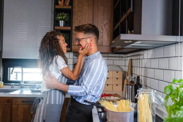 Happy Multiethnic Couple Cooking Homemade Tomatoes Basil Pasta Cooking Home — Stock Photo, Image