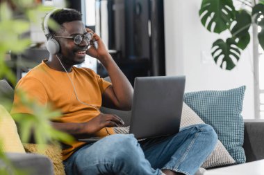 african american man working on laptop 